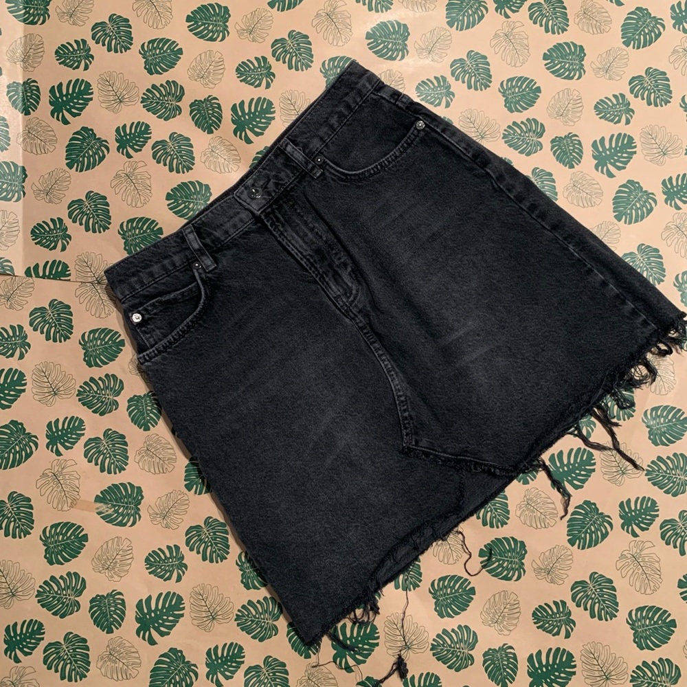 Free People Distressed black denim cut off skirt